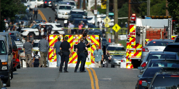 Police survey a shooting scene after a gunman opened fire on Republican members of Congress during a baseball practice near Washington in Alexandria, Virginia, June 14, 2017. REUTERS/Joshua Roberts