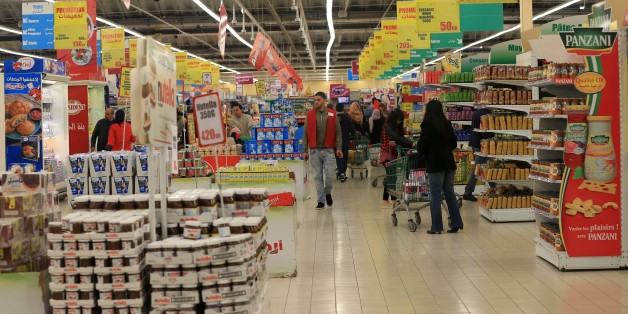 Customers pass packets of pasta stacked on shelves in a DESPAR Italia supermarket, part of the Spar International group, in Rome, Italy, on Monday, July 23, 2012. Italy shipped in 7.3 million tons of wheat last year, making the country the third-biggest importer of the grain after Egypt and Algeria, according to figures from the Geneva-based International Trade Centre. Photographer: Andrey Rudakov/Bloomberg via Getty Images