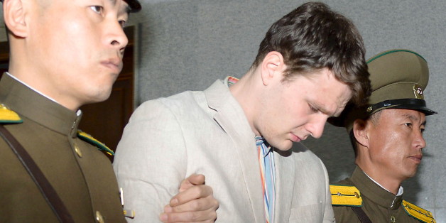 Otto Frederick Warmbier (C), a University of Virginia student who was detained in North Korea since early January, is taken out of North Korea's top court after being sentenced, in Pyongyang, North Korea, in this photo released by Kyodo March 16, 2016. North Korea's supreme court sentenced American student Warmbier, who was arrested while visiting the country, to 15 years of hard labour for crimes against the state, China's Xinhua news agency reported on Wednesday. Mandatory credit REUTERS/Ky