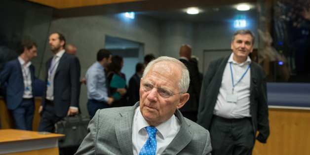 Wolfgang Schaeuble, Germany's finance minister, center, arrives ahead of Euclid Tsakalotos, Greece's finance minister, left, for a Eurogroup meeting of European finance ministers in Luxembourg on Thursday, June 15, 2017. Euro area finance ministers plan to disburse EU8.5b bailout tranche for Greece, two officials familiar with the matter say, asking not to be named, pending final decision. Photographer: Jasper Juinen/Bloomberg via Getty Images