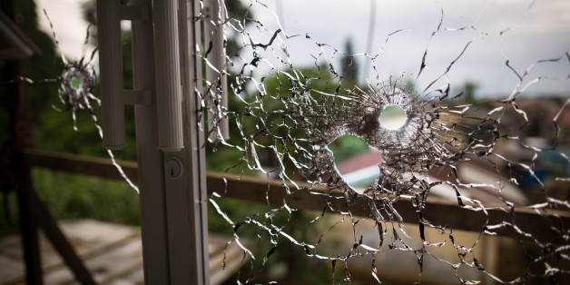 An abandoned hospital window is seen full of bullet holes after a heavy fight, as government soldiers continue their assault against the Maute group in Marawi City, Philippines June 12, 2017.
(Photo by Richard Atrero de Guzman/NurPhoto via Getty Images)