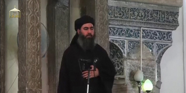 A man purported to be the reclusive leader of the militant Islamic State Abu Bakr al-Baghdadi has made what would be his first public appearance at a mosque in the centre of Iraq's second city, Mosul, according to a video recording posted on the Internet on July 5, 2014, in this still image taken from video. There had previously been reports on social media that Abu Bakr al-Baghdadi would make his first public appearance since his Islamic State in Iraq and the Levant (ISIL) changed its name to t