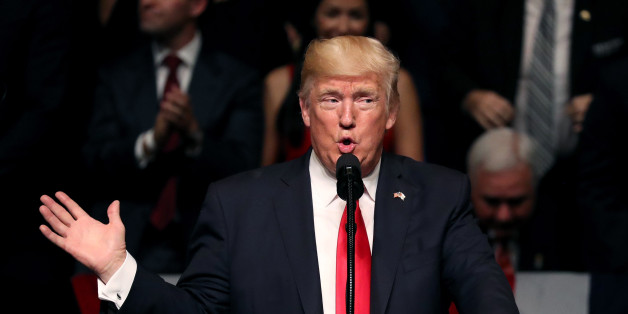 MIAMI, FL - JUNE 16: U.S. President Donald Trump speaks about policy changes he is making toward Cuba at the Manuel Artime Theater in the Little Havana neighborhood on June 16, 2017 in Miami, Florida. The President will re-institute some of the restrictions on travel to Cuba and U.S. business dealings with entities tied to the Cuban military and intelligence services. (Photo by Joe Raedle/Getty Images)