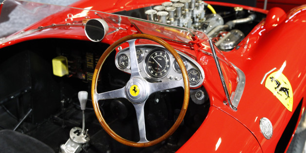 PARIS, FRANCE - FEBRUARY 02: The dashboard of the Ferrari 335 S Spider Scaglietti from the Pierre Bardinon collection is displayed for auction during the Retromobile show on February 02, 2016 in Paris, France. The car is manufactured by Ferrari workshops in early 1957 and is dressed with a Scaglietti bodywork. It is equipped with a Tipo 140 V12 (315 S) 3.8-liter twin overhead camshafts per cylinder, developing some 360 bhp. This car is estimated between 28 and 32 Millions euros / 30 and 34 Mill