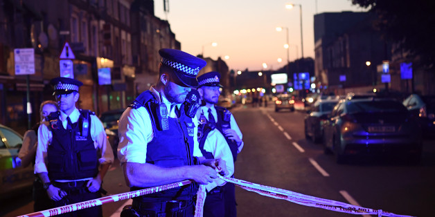 LONDON, ENGLAND - JUNE 19: Police officers guard a road leading to Finsbury Park Mosque after an incident in which a van hit worshippers outside the building on June 19, 2017 in London, England. According to reports, worshipers were struck as they were leaving a mosque in North London after Ramadan prayers. (Photo by Carl Court/Getty Images)