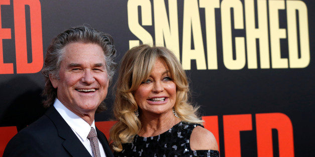 Cast member Goldie Hawn and actor Kurt Russell pose at the premiere of the movie "Snatched" in Los Angeles, California, U.S., May 10, 2017. REUTERS/Mario Anzuoni