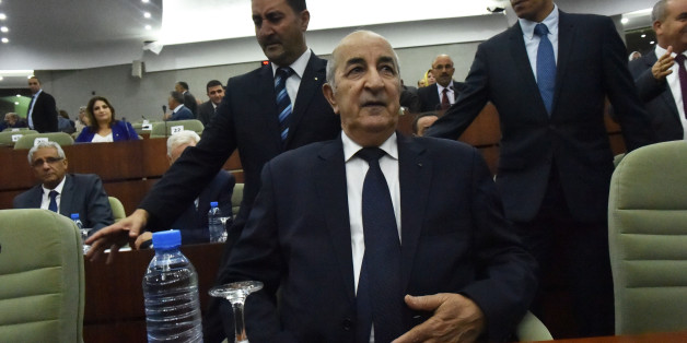 Prime Minister Abdelmadjid Tebboune (C) unveiled the main lines of the government's action plan to members of the National People's Congress (NPC) on June 20, 2017 in Algiers. / AFP PHOTO / RYAD KRAMDI / RYAD KRAMDI (Photo credit should read RYAD KRAMDI/AFP/Getty Images)