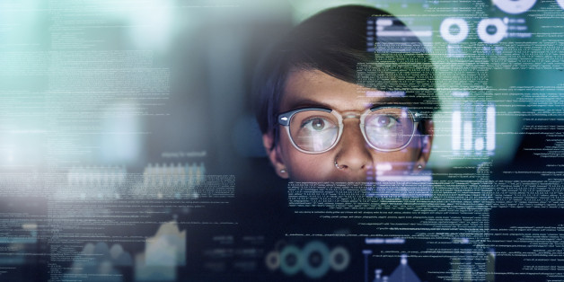 Cropped shot of a young computer programmer looking through data