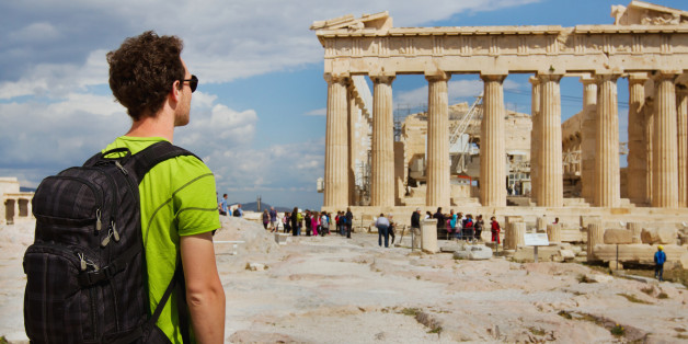 tourist looking at Parthenon, Acropolis ruin, Athens, Greece