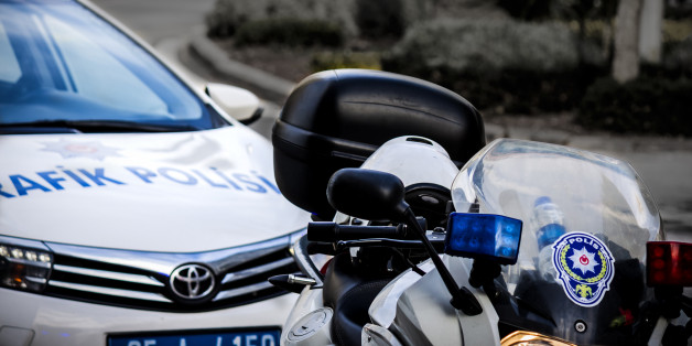 Turkey, January 11, 2017: Car and bike of turkish police on the street in the city of Izmir. policemen are not in the picture