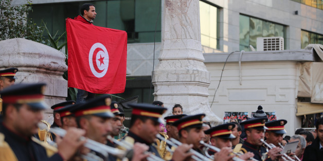 TUNIS, TUNISIA - JANUARY 13: Tunisian military band performs at the Habib Bourguiba street in Tunis on January 13,2015 during the celebration of the 4th anniversary of the January 14 revolution. (Photo by Nacer Talel/Anadolu Agency/Getty Images)