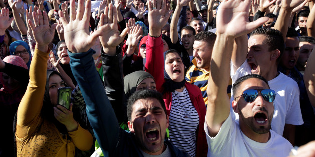 Thousands of Moroccans shout slogans during a demonstration in the northern town of Al-Hoceima, seven months after a fishmonger was crushed to death inside a garbage truck as he tried to retrieve fish confiscated by the police, in Al-Hoceima, Morocco May 18, 2017. REUTERS/Youssef Boudlal