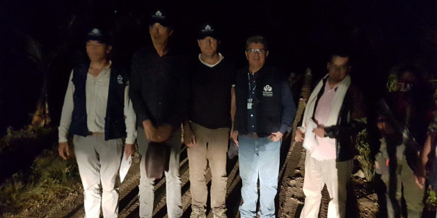 A handout picture released by the Colombian Ombudsman press office shows two Dutch Derk Johannes Bolt (2-L) and Eugenio Ernest Marie Follender (2-R) after their released by National Liberation Army ELN guerrillas, upon arriving in Catatumbo, department of North of Santander on June 24, 2017. / AFP PHOTO / Colombian Ombudsman / Alejandro HORACK (Photo credit should read ALEJANDRO HORACK/AFP/Getty Images)