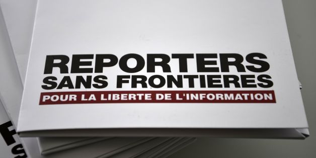 A picture taken on April 26, 2017 at the Agence France Presse (AFP) headquarters in Paris shows copies of the annual World Press Freedom Index of Reporters sans frontieres (RSF - Reporters without borders).
RSF World Press Freedom Index warned of the 'highly toxic' media-bashing of Trump's election campaign and Britain's Brexit referendum, and said the situation was at 'a tipping point'. / AFP PHOTO / PHILIPPE LOPEZ (Photo credit should read PHILIPPE LOPEZ/AFP/Getty Images)