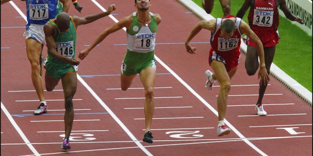 FRANCE - AUGUST 31: 9Th Athletics World Championship In St Denis. On August 31, 2003 In Saint-Denis, France. Algeria'S Djabir Said-Guerni, Centre, Crosses The Line Ahead Of Russia'S Yuriy Borzakovskiy, Right, And South Africa'S Mbulaeni Mulaudza, Left, To Win The Gold Medal In The Men'S 800 Meters At The World Athletics Championships In The Stade De France, Saint Denis. (Photo by Gilles BASSIGNAC/Gamma-Rapho via Getty Images)