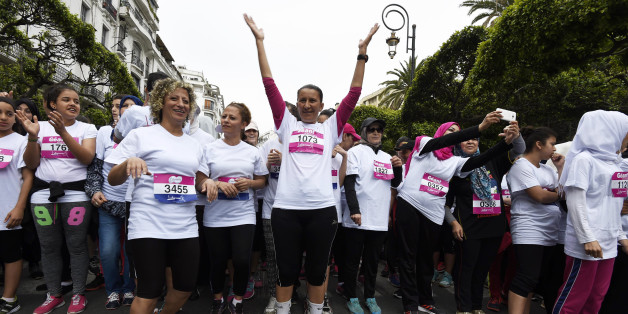 Women wait before taking the start of the 100% women and supportive race, named the Algerian womens race (L'Algeroise) on May 6, 2016 in the capital Algiers. The event, taking place for the first time, is a 3km run intended for women and aims at raising womens awareness on sports. / AFP / Farouk Batiche (Photo credit should read FAROUK BATICHE/AFP/Getty Images)