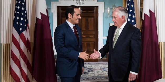 Qatar's Foreign Minister Mohammed bin Abdulrahman al-Thani (L) and US Secretary of State Rex Tillerson shake hands before a meeting at the US State Department on June 27, 2017 in Washington, DC. / AFP PHOTO / Brendan Smialowski (Photo credit should read BRENDAN SMIALOWSKI/AFP/Getty Images)