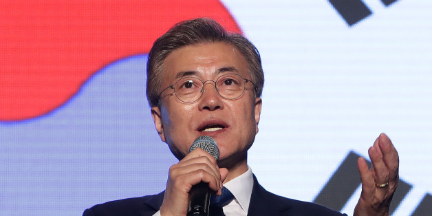 SEOUL, SOUTH KOREA - MAY 09: South Korean President-elect Moon Jae-in, of the Democratic Party of Korea, speaks to supporters at Gwanghwamun Square on May 9, 2017 in Seoul, South Korea. Moon Jae-in declared victory in South Korea's presidential election, which was called seven months early after former President Park Geun-hye was impeached for her involvement in a corruption scandal. (Photo by Chung Sung-Jun/Getty Images)