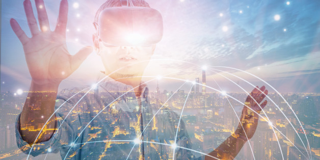 Double exposure of man wearing virtual reality headset