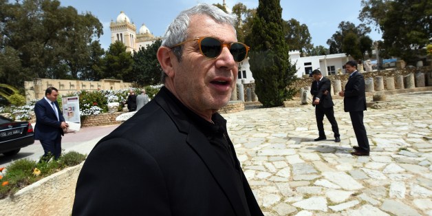 French actor Michel Boujenah visits the archaeological site of Carthage, north of Tunis, on April 18, 2015. A month after the March 18 gun attack on the capital's Bardo National Museum, French Culture Minister Fleur Pellerin and members of a delegation, including Boujenah, visit Tunisia to express their support to the families of the victims and to the Tunisian people. AFP PHOTO / FETHI BELAID (Photo credit should read FETHI BELAID/AFP/Getty Images)