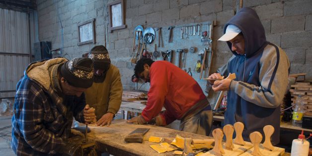 Inmates work in carpentry workshop at the Punta de Rieles prison in Montevideo on June 15, 2016.
Punta de Rieles penitentiary is considered a model prison which aims at functioning 'as much as possible' as a village, with inmates roaming freely within the precinct, and working as hairdressers, cooks or farmers. / AFP / PABLO PORCIUNCULA (Photo credit should read PABLO PORCIUNCULA/AFP/Getty Images)