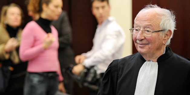 The lawyer of French Air France Concorde's captain family, Roland Rappaport (R) arrives on December 6, 2010 at Pontoise courthouse, north of Paris, for the verdict in the trial to determine who was to blame for the 2000 Concorde disaster which killed 113 people. During the four-month trial, judges have tried to determine the responsibilities of US Continental Airline and the responsability of three former heads of the French 'Aviation civile' (French air transports authority). AFP PHOTO FRANCK F