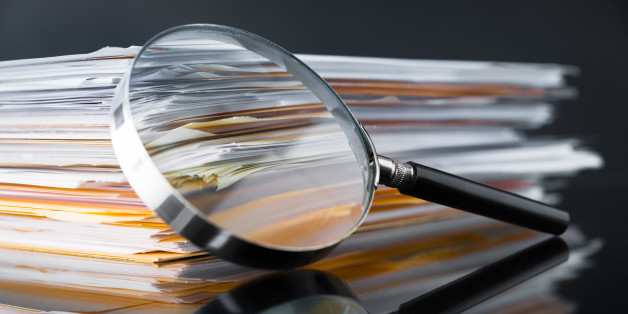 File Stack and Magnifying Glass