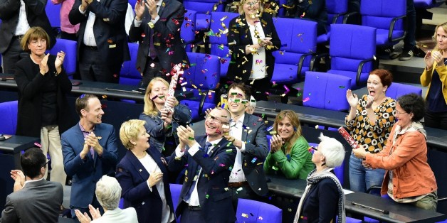 MP´s from the Green party celebrate with confetti following a debate and vote on same-sex marriage in Bundestag, Germany´s lower house of Parliament in Berlin on June 30, 2017.
A clear majority of German MPs voted to legalise same-sex marriage, days after Chancellor Angela Merkel dropped her opposition to the idea. / AFP PHOTO / Tobias SCHWARZ (Photo credit should read TOBIAS SCHWARZ/AFP/Getty Images)