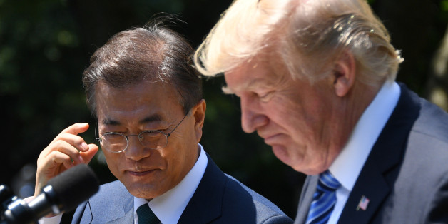 US President Donald Trump (R) and South Korean President Moon Jae-in look on during a joint press conference in the Rose Garden at the White House in Washington, DC, on June 30, 2017. / AFP PHOTO / JIM WATSON (Photo credit should read JIM WATSON/AFP/Getty Images)