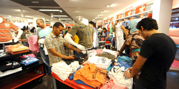 Tunisians shop at a shopping center in Tunis on July 28, 2011. Food and textile prices have risen ahead of Ramadan, mostly due to the situation in neighbouring Libya. AFP PHOTO / FETHI BELAID (Photo credit should read FETHI BELAID/AFP/Getty Images)