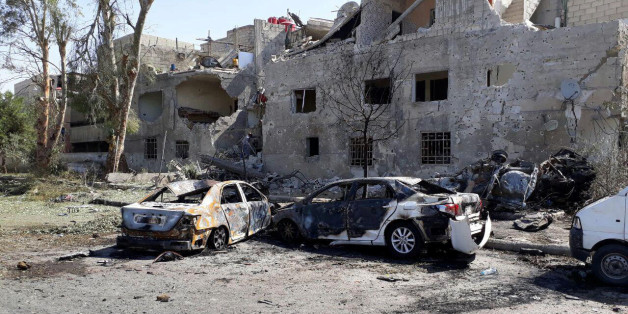 Damaged cars are seen at one of the blast sites in Damascus in this handout picture posted on SANA on July 2, 2017, Syria. SANA/Handout via REUTERS ATTENTION EDITORS - THIS PICTURE WAS PROVIDED BY A THIRD PARTY. REUTERS IS UNABLE TO INDEPENDENTLY VERIFY THE AUTHENTICITY, CONTENT, LOCATION OR DATE OF THIS IMAGE