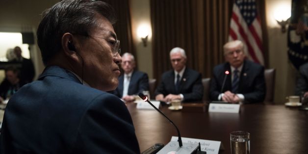 From left South Korea's President Moon Jae-in, US Secretary of Defense James Mattis, US Vice President Mike Pence and US President Donald Trump listen to opening comments before a meeting in the Cabinet Room of the White House June 30, 2017 in Washington, DC. / AFP PHOTO / Brendan Smialowski (Photo credit should read BRENDAN SMIALOWSKI/AFP/Getty Images)