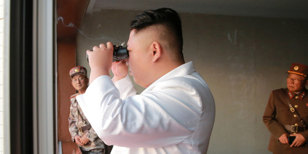 North Korean leader Kim Jong Un looks on during a ballistic rocket test-fire through a precision control guidance system in this undated photo released by North Korea's Korean Central News Agency (KCNA) May 30, 2017. KCNA/via REUTERS ATTENTION EDITORS - THIS IMAGE WAS PROVIDED BY A THIRD PARTY. EDITORIAL USE ONLY. REUTERS IS UNABLE TO INDEPENDENTLY VERIFY THIS IMAGE. NO THIRD PARTY SALES. SOUTH KOREA OUT.