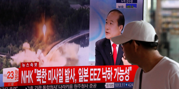 A man watches a TV broadcast of a news report on North Korea's ballistic missile test, at a railway station in Seoul, South Korea, July 4, 2017. REUTERS/Kim Hong-Ji TPX IMAGES OF THE DAY
