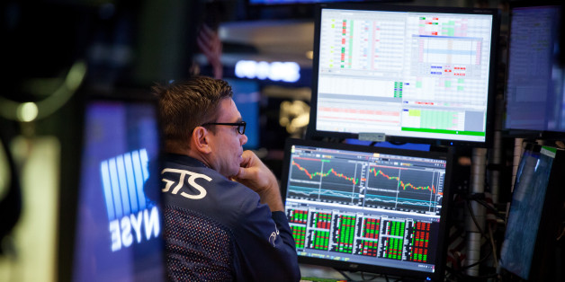 A trader works on the floor of the New York Stock Exchange (NYSE) in New York, U.S., on Friday, June 23, 2017. U.S. stocks edged higher, while Treasuries and the dollar edged lower as a week dominated by crudes tumble into a bear market ended with a tone of caution prevailing. Photographer: Michael Nagle/Bloomberg via Getty Images