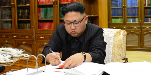 North Korean Leader Kim Jong Un signs the order to carry out the test-fire of inter-continental ballistic rocket Hwasong-14 in this undated photo released by North Korea's Korean Central News Agency (KCNA) in Pyongyang, July, 4 2017. KCNA/via REUTERS ATTENTION EDITORS - THIS IMAGE WAS PROVIDED BY A THIRD PARTY. REUTERS IS UNABLE TO INDEPENDENTLY VERIFY THIS IMAGE. NO THIRD PARTY SALES. SOUTH KOREA OUT. TPX IMAGES OF THE DAY