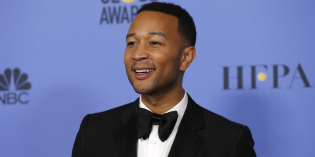 John Legend poses backstage after presenting an award during the 74th Annual Golden Globe Awards in Beverly Hills, California, U.S., January 8, 2017. REUTERS/Mario Anzuoni