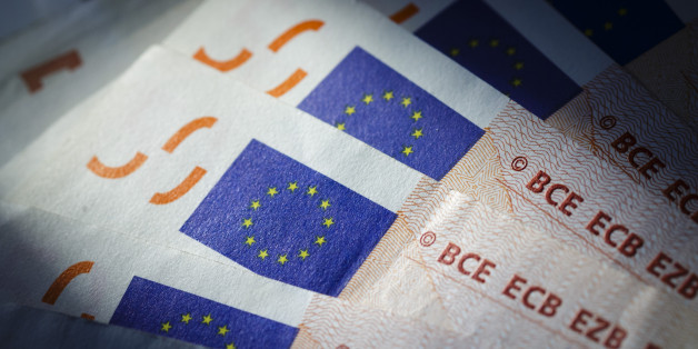 Berlin, Germany - August 03: In this Photo Illustration the flag of the European Union can be seen on euro banknotes on August 03, 2016 in Berlin, Germany. (Photo Illustration by Thomas Trutschel/Photothek via Getty Images)