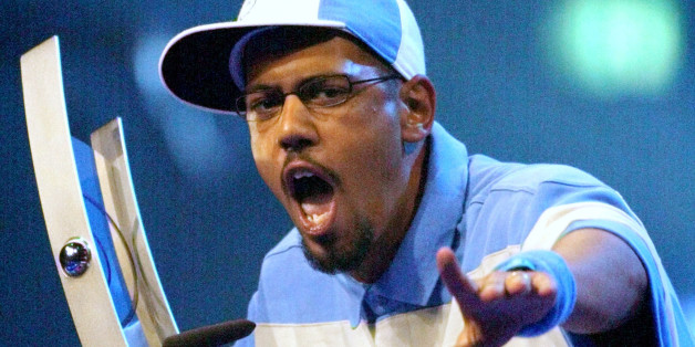 German singer Samy Delux addresses the audience after he accepted the"Echo" music award for the best national Hip Hop group during aceremony in Berlin March 7, 2002. The phonographic academy of Germanyawarded the "Echo" - a German version of the "Grammy" awards - in 25categories on Thursday. REUTERS/Fabrizio BenschFAB/JD