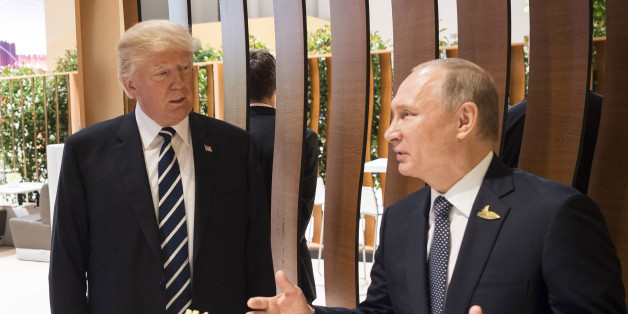 HAMBURG, GERMANY - JULY 07: In this photo provided by the German Government Press Office (BPA), Donald Trump, President of the USA (C) meets Vladimir Putin, President of Russia during the G20 Summit on July 7, 2017 in Hamburg, Germany. The G20 group of nations are meeting July 7-8 and major topics will include climate change and migration. (Photo by BPA via Getty Images)