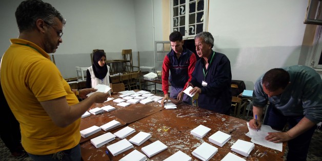 Scrutineers count votes at the end of the Algerian parliamentary elections late on May 4, 2017, in the capital Algiers. (Photo by Billal Bensalem/NurPhoto via Getty Images)