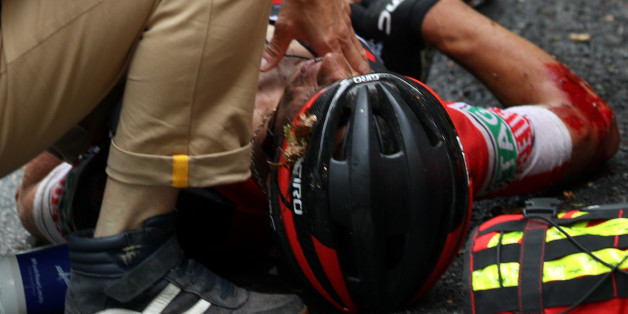 CHAMBERY, FRANCE - JULY 09: Richie Porte of Australia riding for BMC Racing Team is attended to by medical staff after crashing during stage 9 of the 2017 Le Tour de France, a 181.5km stage from Nantua to Chambéry on July 9, 2017 in Chambery, France. (Photo by Chris Graythen/Getty Images)