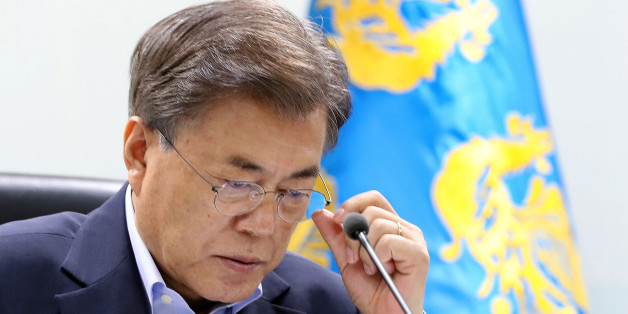SEOUL, SOUTH KOREA - JULY 04: In this handout photo released by the South Korean Presidential Blue House, South Korean President Moon Jae-in speaks as he presides over a meeting of the National Security Council at the presidential Blue House on July 4, 2017 in Seoul, South Korea. North Korea fired an unidentified ballistic missile on Tuesday from a location near the North's border with China into waters at Japan's exclusive economic zone, east of the Korean Peninsula, according to reports. The latest launch have drawn strong criticism from the U.S. and came ahead of a summit of leaders from the Group of 20 countries in Germany later this week. (Photo by South Korean Presidential Blue House via Getty Images)