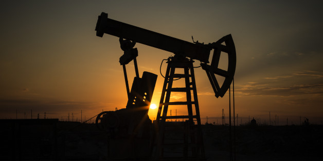 Fossil Fuel Energy, Oil Pump, Pumpjack, Old Pumping Unit, Jack Pump, Sunset.Rows of oil donkey in silhouette at sunset crude oil.