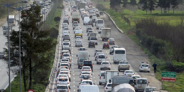Cars drive on a road in the Algerian capital Algiers on February 1, 2017. / AFP / STRINGER (Photo credit should read STRINGER/AFP/Getty Images)