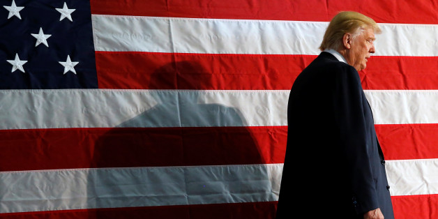 Republican presidential nominee Donald Trump takes the stage for a campaign rally in Colorado Springs, Colorado, U.S. October 18, 2016. REUTERS/Jonathan Ernst