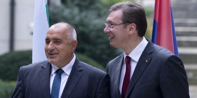 Romanian Prime Minister Victor Ponta (L) chats with Bulgarian Prime minister Boyko Borisov (C) and Serbian counterpart Aleksandar Vucic before their meeting in Sofia on October 24, 2015. The prime ministers of Serbia, Bulgaria and Romania hold talks today on how to tackle record numbers of migrants at the onset of winter, ahead of a mini-EU summit to discuss a coordinated response. AFP PHOTO / NIKOLAY DOYCHINOV (Photo credit should read NIKOLAY DOYCHINOV/AFP/Getty Images)