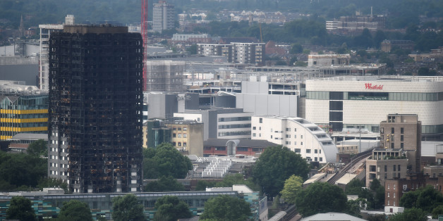 The burnt out remains of the Grenfell apartment tower are seen in North Kensington, London, Britain, June 29, 2017. REUTERS/Hannah McKay