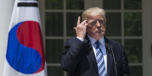 WASHINGTON, DC - JUNE 30: President Donald Trump listens while South Korean President Moon Jae-in speaks in the Rose Garden of the White House in Washington D.C. on Friday, June 30, 2017. (Photo by Calla Kessler/The Washington Post via Getty Images)
