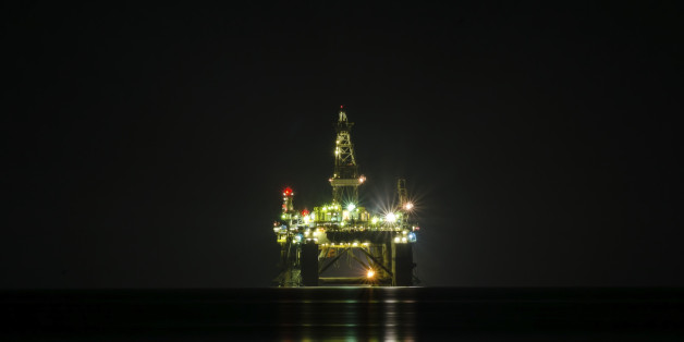 A night view of the oil drilling platform lit up on the coast of Limassol, in Cyprus. The oil rig is floating in the Mediterranean sea and is ready for drilling for natural gas appraisal.
